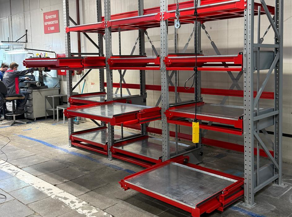 стеллажи с выдвижными полками со встроенной электрической талью